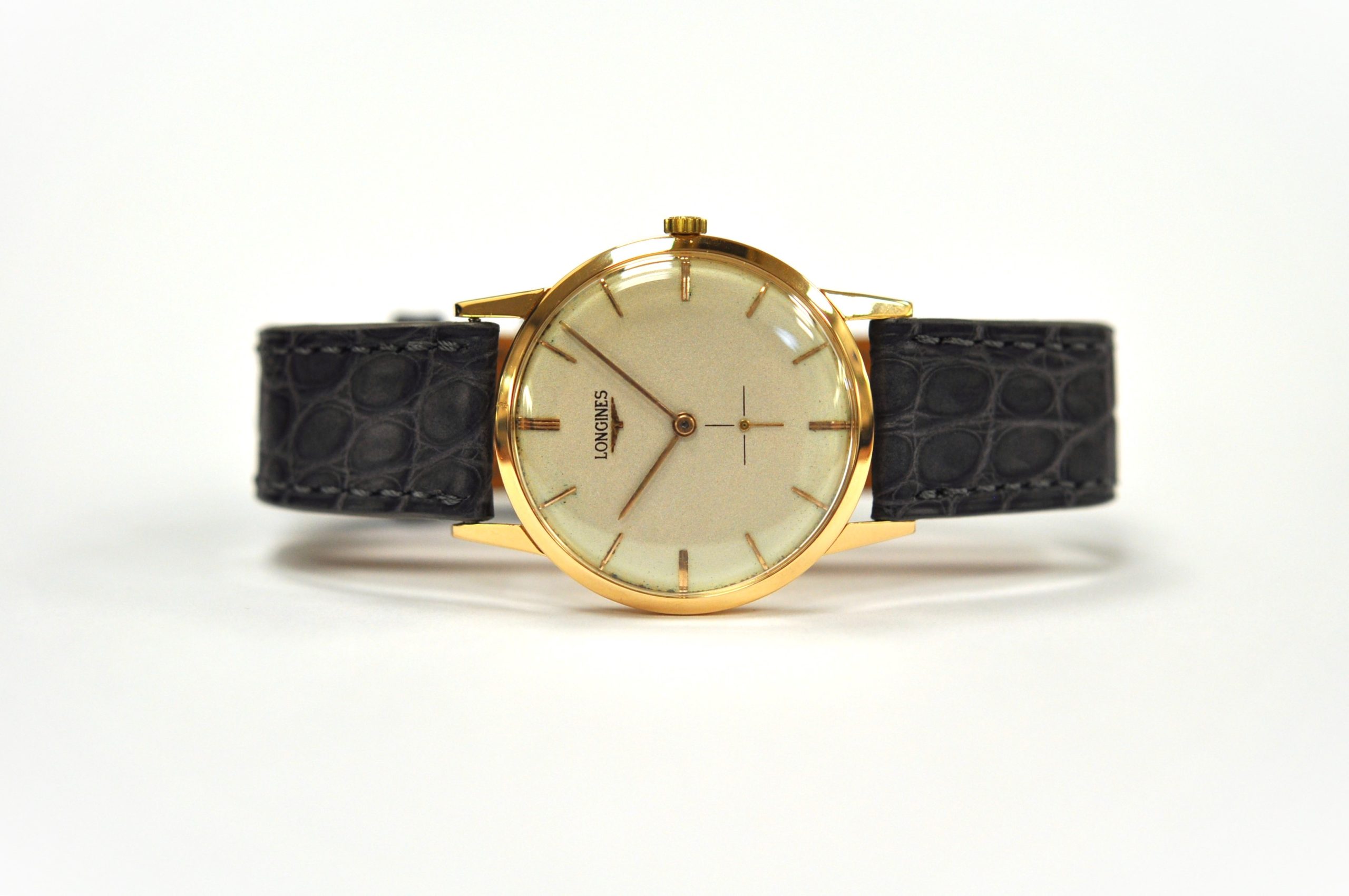 c1950s Longines 18ct strap watch 6888
